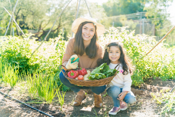 mother and daughter in garden